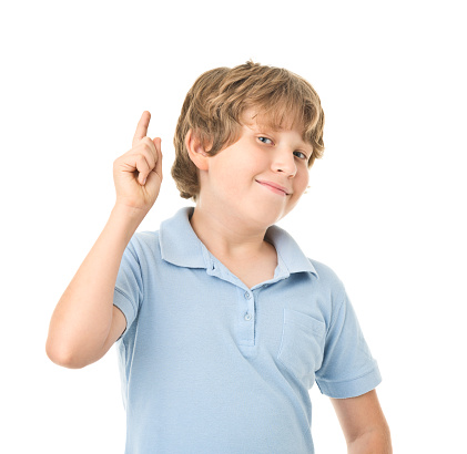 A DSLR photo of 11 years old boy standing.Pictures isolated on white backround.