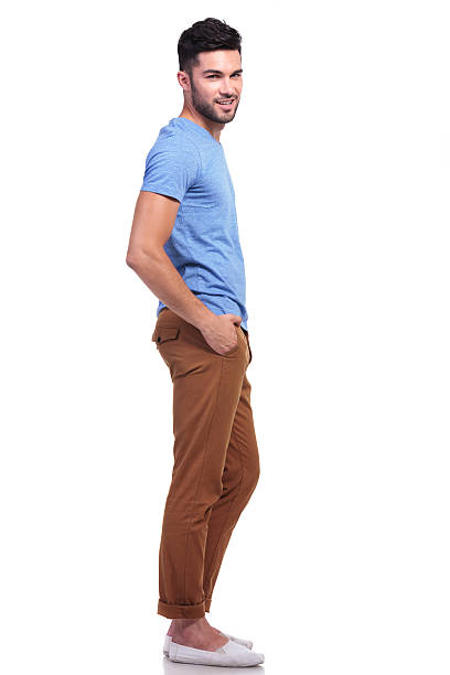 istock young casual man with hands in his pockets 487767865
