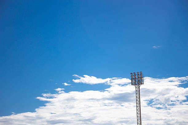 istock Old spot light pole of the sport field 487768824