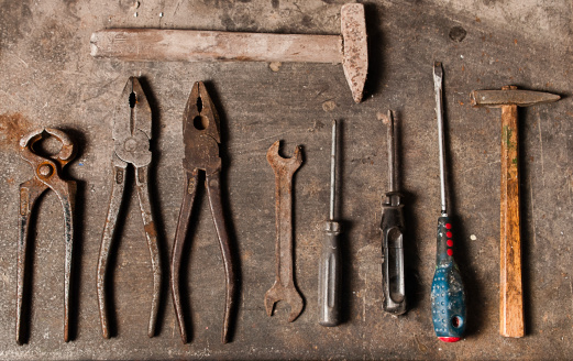 Workbench with rusty tools
