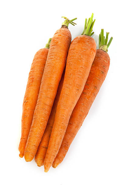 istock Bunch of fresh carrot isolated on white 487770399