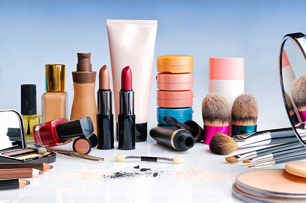 makeup set on table front view makeup set on glass table front view ceremonial make up photos stock pictures, royalty-free photos & images