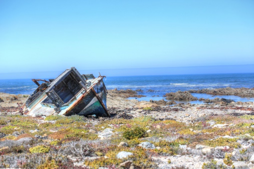 Diamond divers wrecked boat on the South African Northern Cape Namaqualand Skeleton Coast.