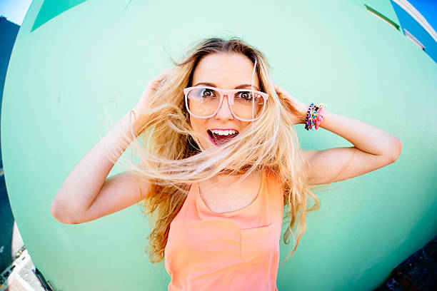 Portrait of young woman on a windy day