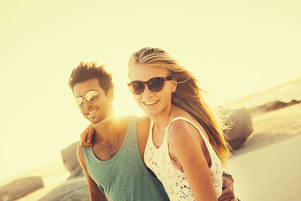 istock Retro Hipster Couple on beach 487774069
