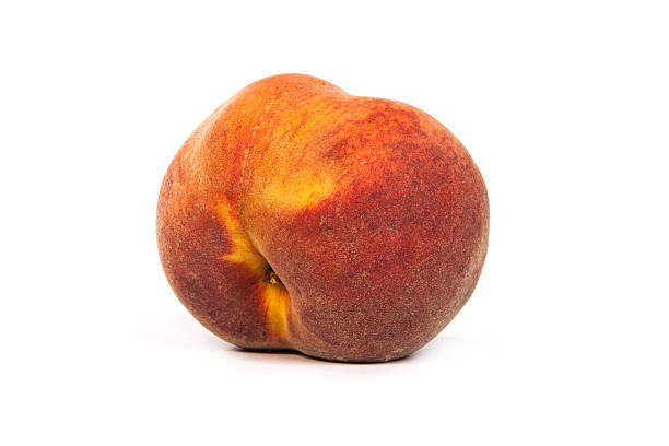 istock One tasty juicy peache on a white background 487774143