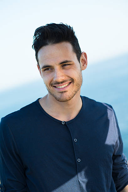istock handsome young men on vacation by the sea 487774253
