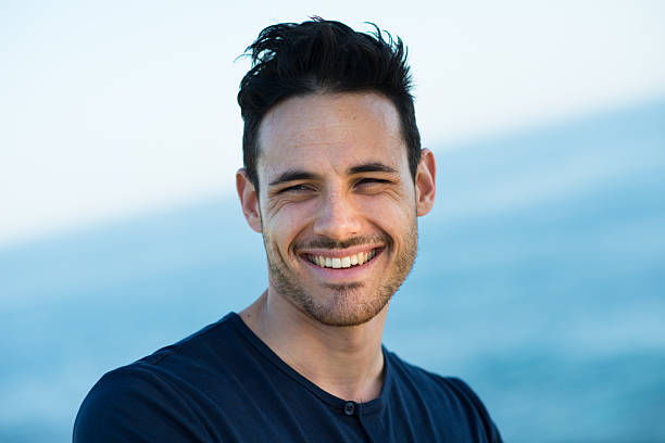 istock handsome young men on vacation by the sea 487774281