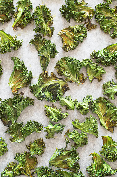 Baked curly kale chips on the baking tray