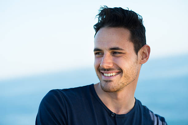 istock handsome young men on vacation by the sea 487774479