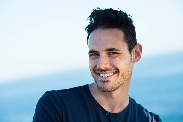 istock handsome young men on vacation by the sea 487774513