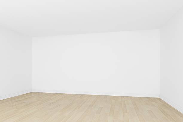 istock white wall with wood floor ,empty room,3d interior 487774575