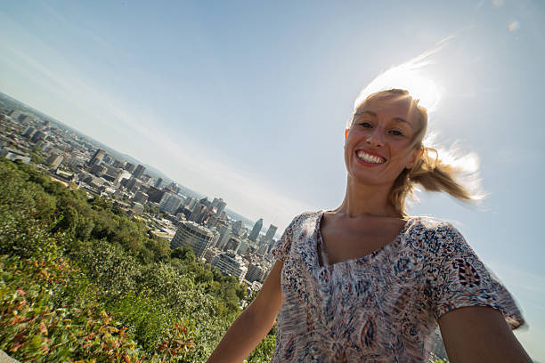 istock French-Canadian taking selfie in Montreal in Summer 487774894