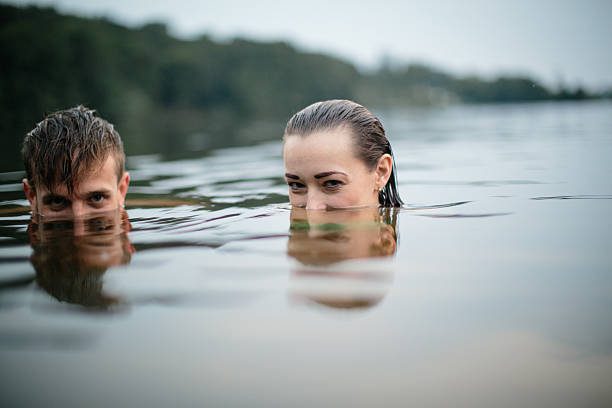 Two young teens at the lake