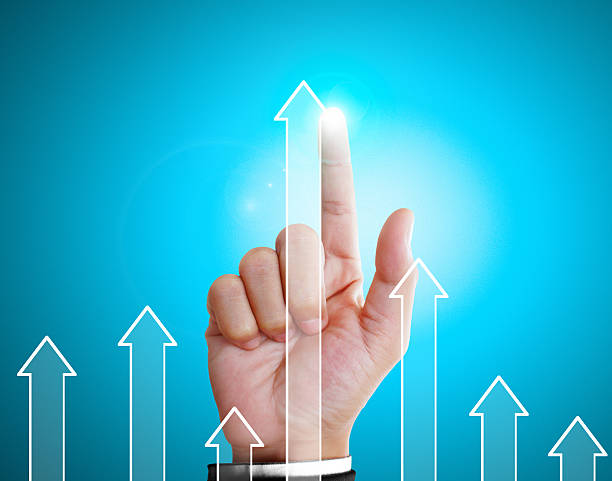 istock financial symbols coming from hand 487780509