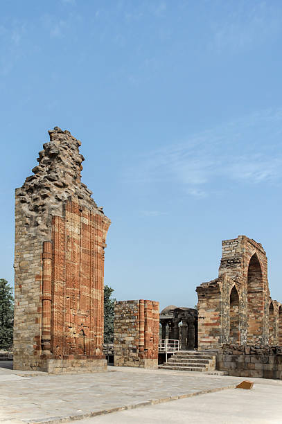istock Qutub brick arch and ruins 487782387