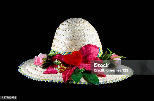 Beach Hat And Flower Isolated On Black With Clipping Path Stock Photo - Download Image Now