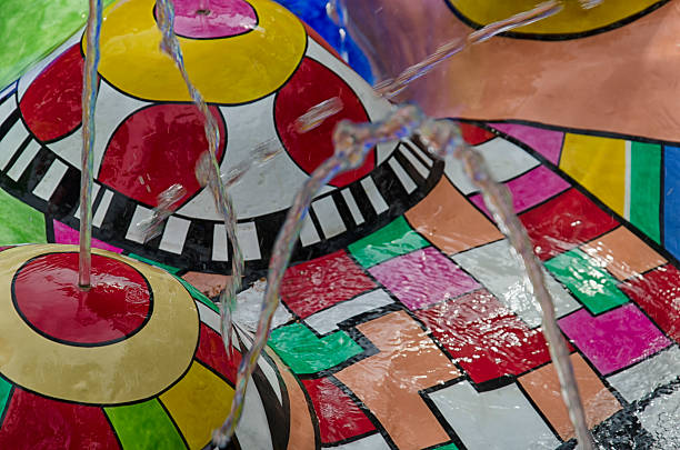 View of water splashes on sculptures in mosaic