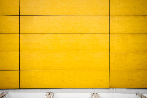 Modern  weathered yellow wall texture background