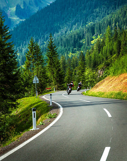 istock Group of motorcyclists in Alpine mountains 487794906