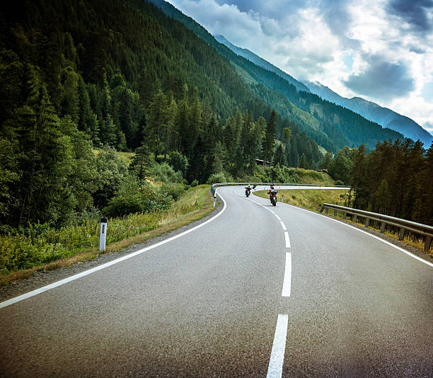istock Group of bikers on mountainous road 487794922