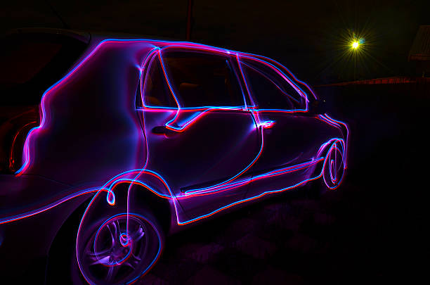 Car painted in Light A car is painted in purple light car led light stock pictures, royalty-free photos & images