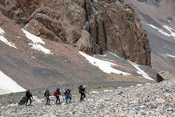 istock People traveling in mountains 487801576