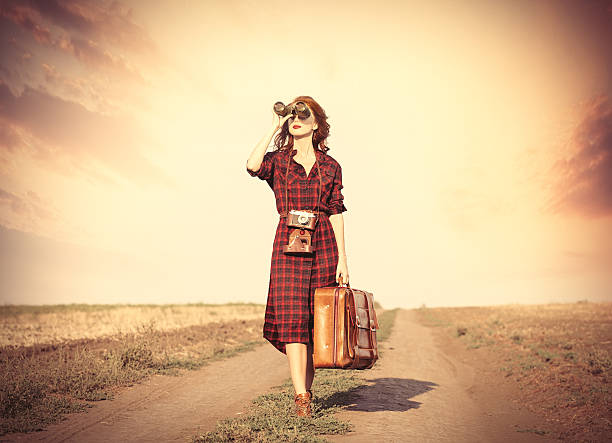 istock girl with bag and binocular 487808244