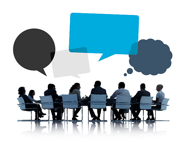 istock Silhouettes of Business People Discussing with Speech Bubbles 487809150