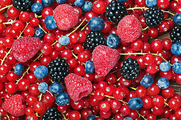 istock fresh blueberries, currants, blackberries, cranberries and raspb 487809597