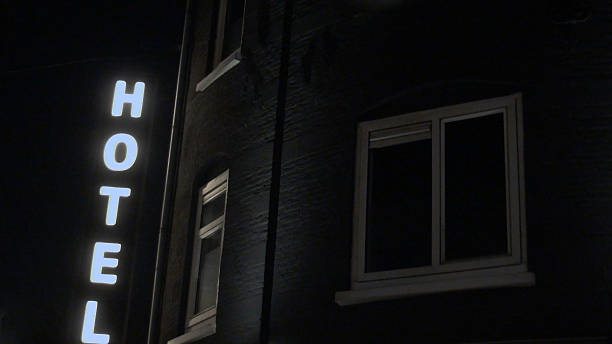istock Looking At Hotel Sign In The Night 487810456