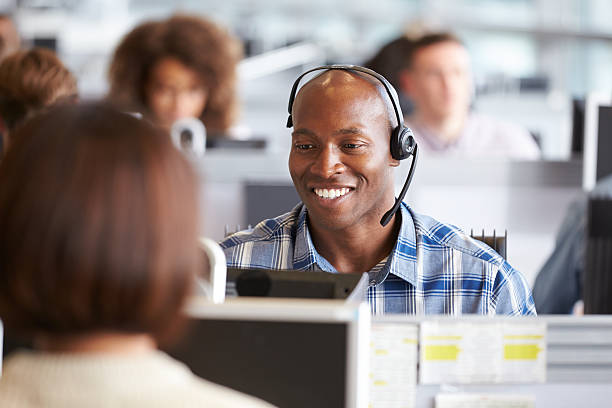 istock African American man working at a computer in call centre 487811086