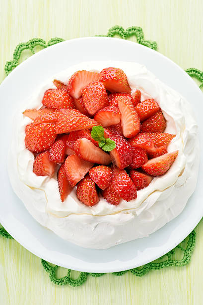 istock Meringue cake decorated with strawberry 487811316