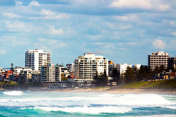 Beautiful beach town with apartments books, blue sky and ocean, Cronulla NSW Australia, full frame horizontal composition with copy space
