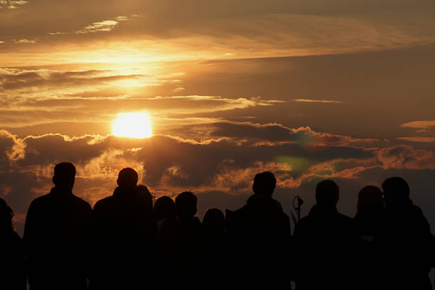 istock Silhouette of people and sunset 487812295
