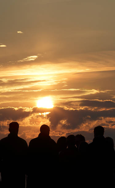 istock Silhouette of people and sunset 487812297