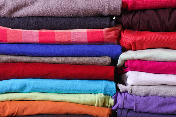 istock Pile of colorful clothes 487812637