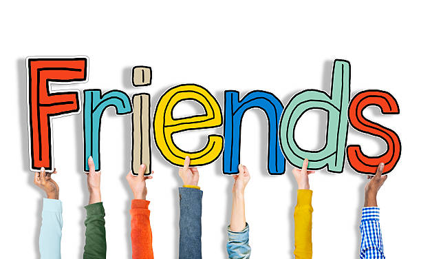 istock Multiethnic Group of Hands Holding Letter Friends 487813802