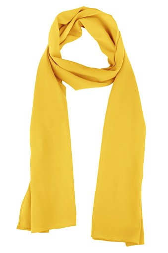 Bufanda de seda. Bufanda de seda amarilla aislado sobre fondo blanco photo