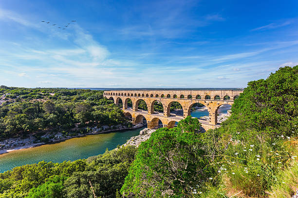 istock Three-tiered aqueduct Pont du Gard and natural park 487823668