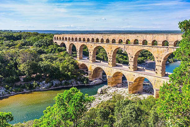 istock Three-tiered aqueduct Pont du Gard and natural park 487823676