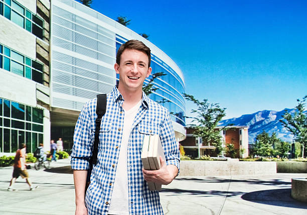 istock Cheerful male student at the university 487827678