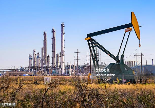 Pumpjack And Refinery Plant In West Texas Stock Photo - Download Image Now