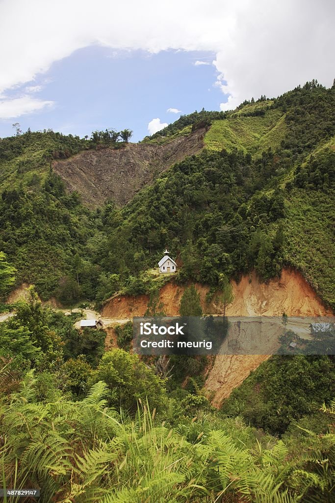 Lonely Church Pentecostal Church stands by a turn in the path from Mamasa to the Torajan Highlands of Sulawesi Deforestation Stock Photo