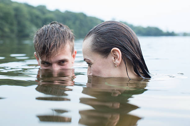istock Two young teens at the lake 487830432