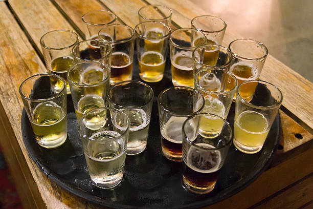 istock Beer and cider brewery taster glasses on a tray 487831033