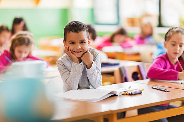 istock Happy African American schoolboy during a class at school. 487831302