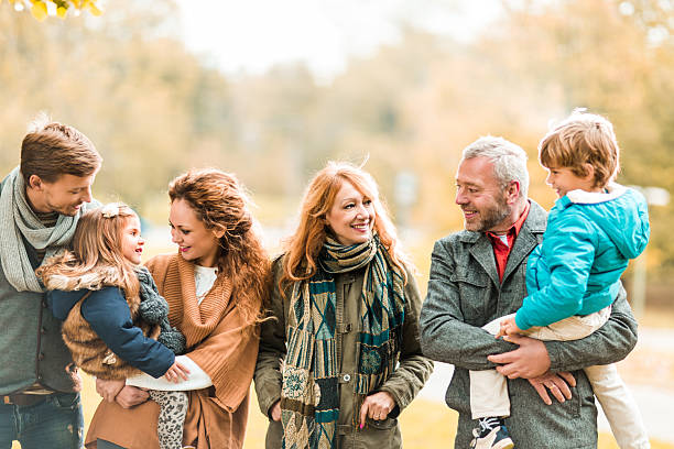 istock Happy multi-generation family walking in nature and communicating. 487831326