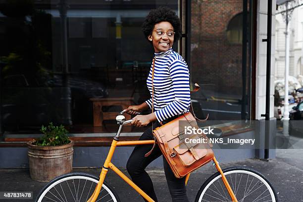 Shes Smiling At The Sights Stock Photo - Download Image Now - Cycling, City, Bicycle