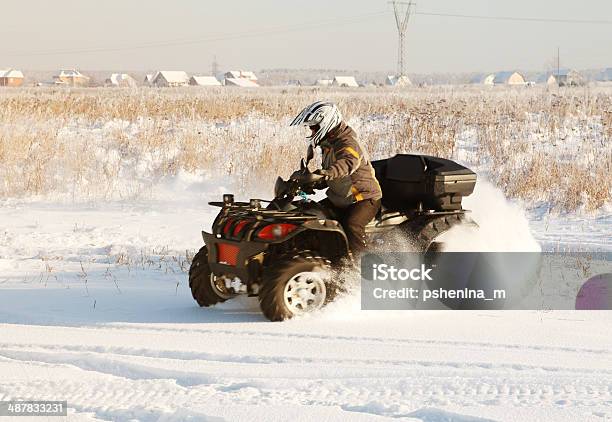 Terrain Vehicle In Motion Stock Photo - Download Image Now - Off-Road Vehicle, Quadbike, Snow